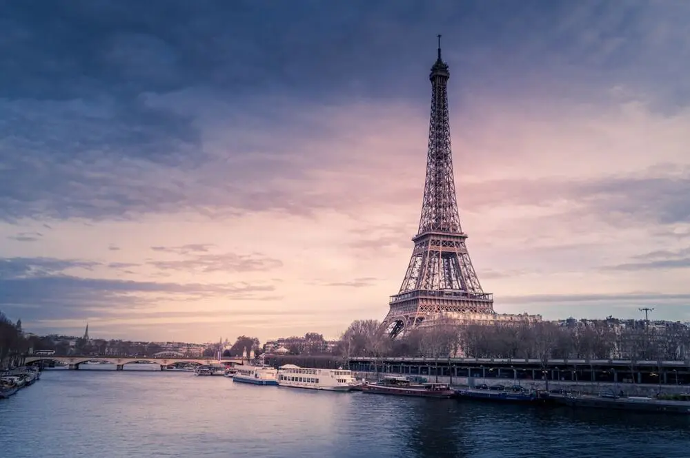 Eiffel Tower at dusk along the Seine