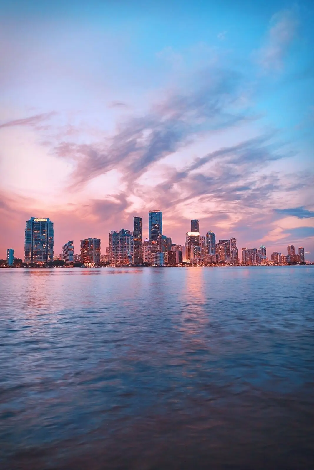Miami skyline at twilight across the bay
